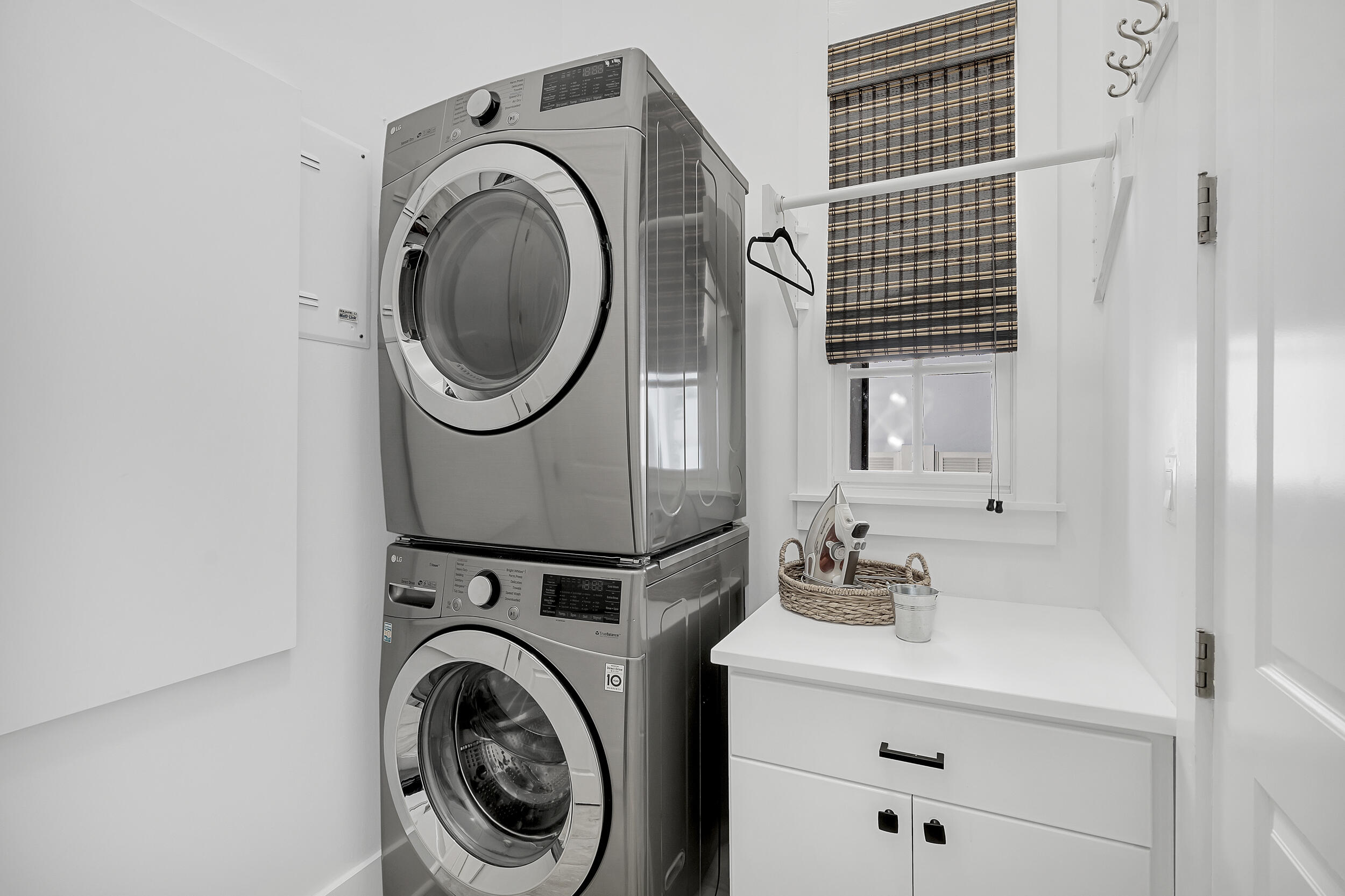 132 Kingston Road Rosemary Beach, FL 32461 - Photo 31 of 70 a utility room with dryer and washer