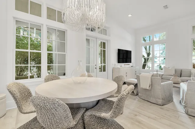 a bathroom with a double vanity sink mirror and toilet