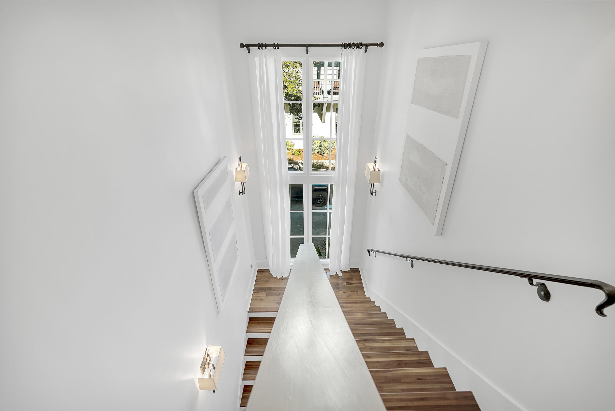 132 Kingston Road Rosemary Beach, FL 32461 - Photo 37 of 70 a view of a hallway with wooden floor and entryway