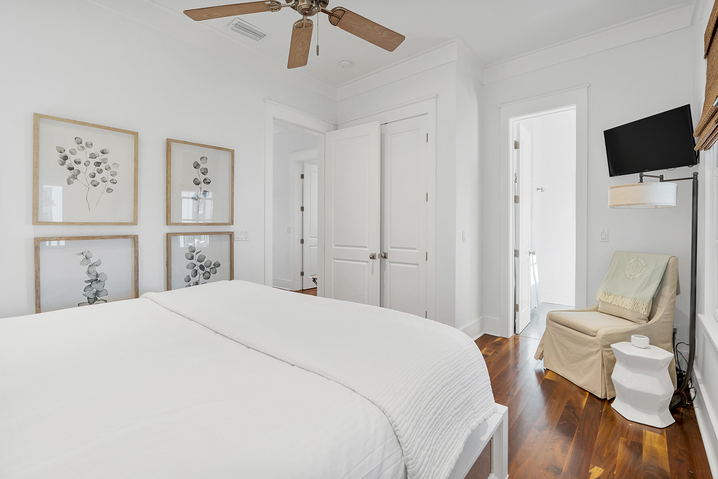 132 Kingston Road Rosemary Beach, FL 32461 - Photo 39 of 70 a spacious bedroom with a bed and a flat screen tv