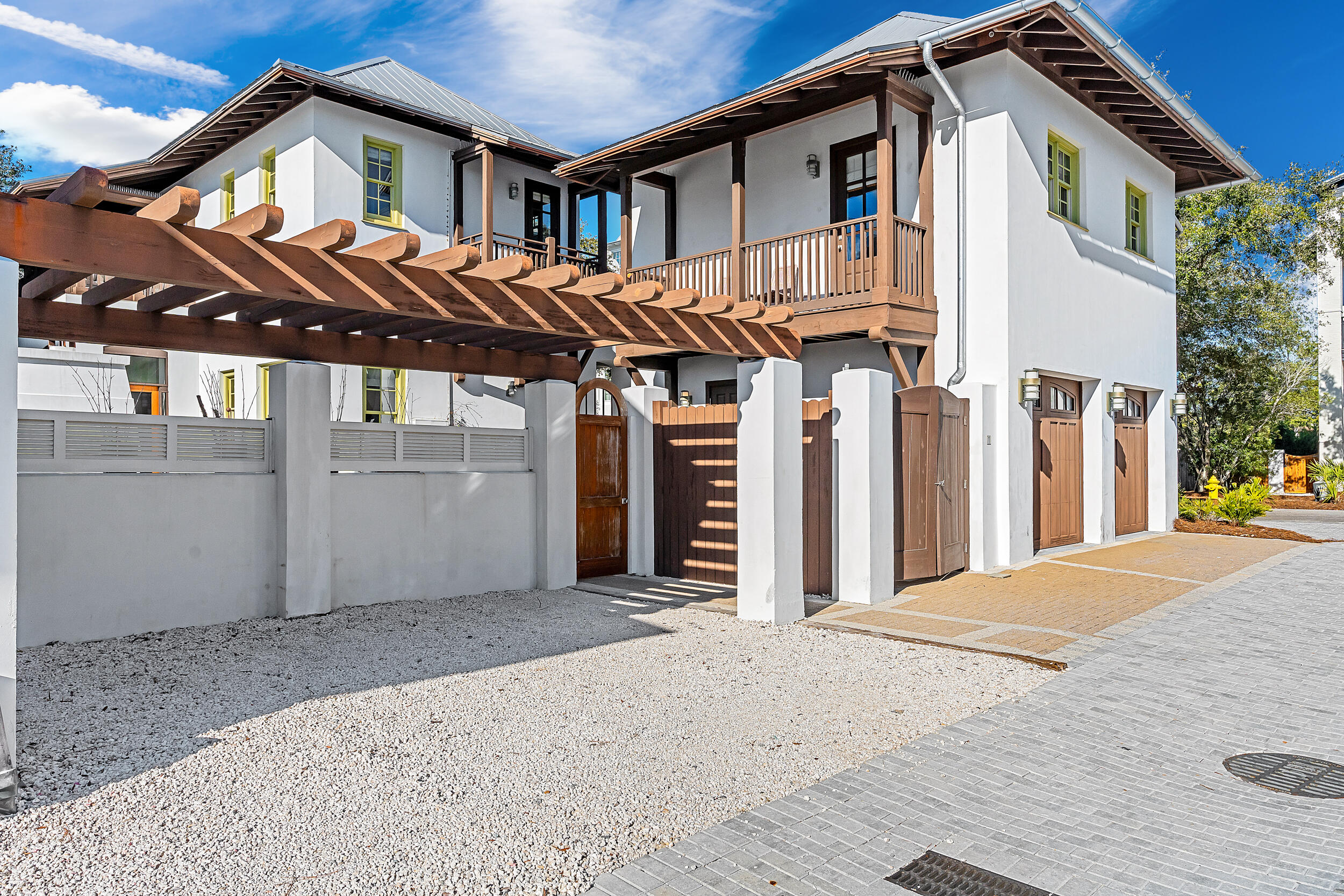 132 Kingston Road Rosemary Beach, FL 32461 - Photo 4 of 70 a front view of a house with a yard