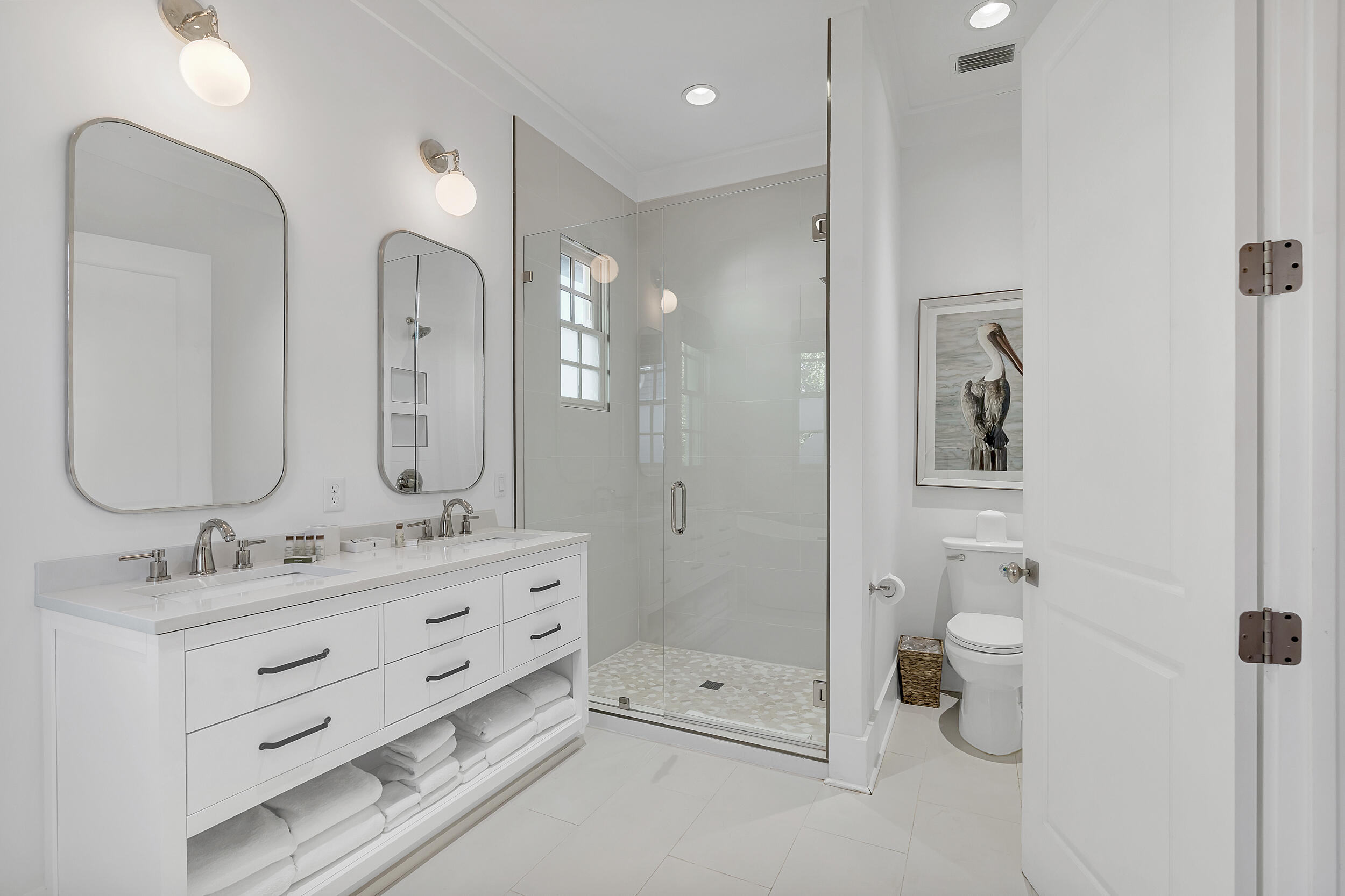 132 Kingston Road Rosemary Beach, FL 32461 - Photo 48 of 70 a bathroom with a double vanity sink mirror and toilet