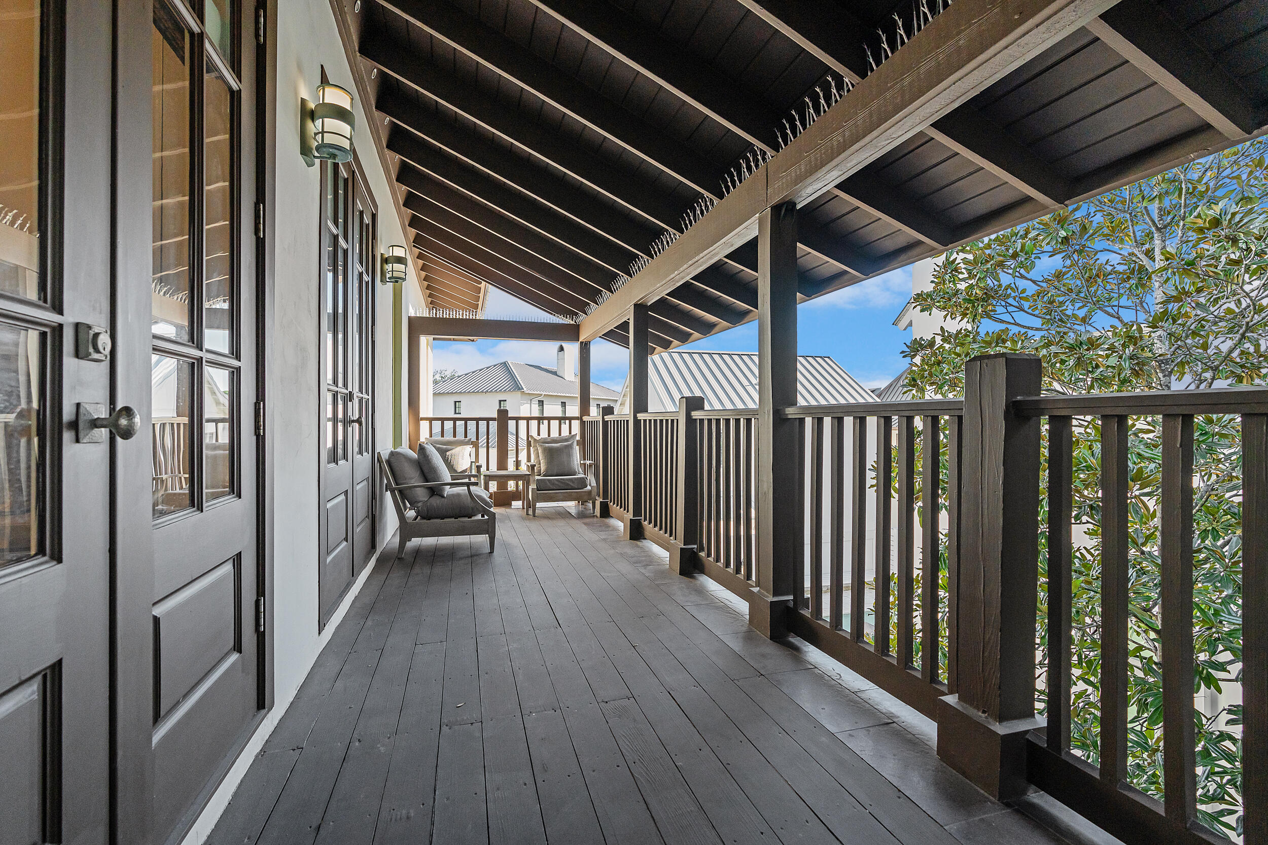 132 Kingston Road Rosemary Beach, FL 32461 - Photo 52 of 70 a view of a balcony with wooden floor