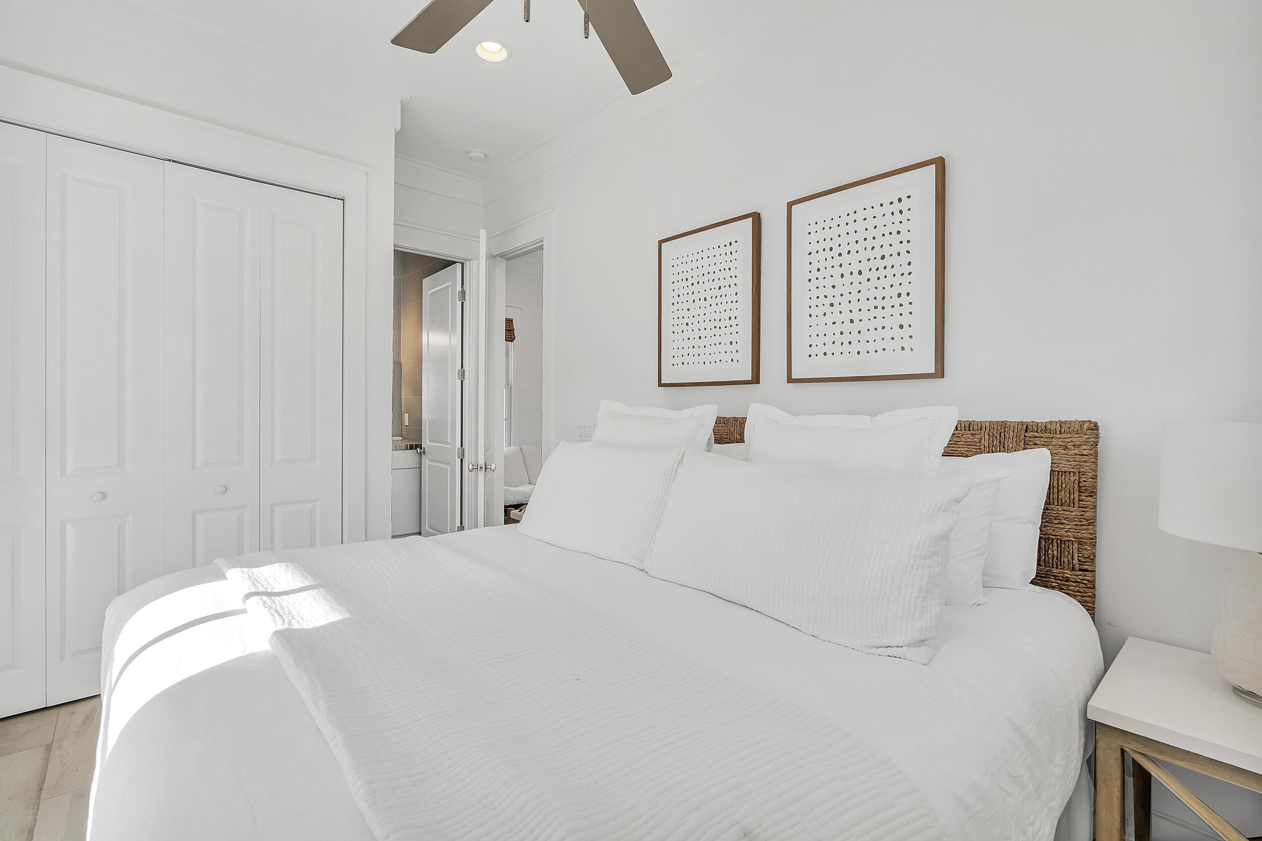 132 Kingston Road Rosemary Beach, FL 32461 - Photo 60 of 70 a bedroom with a bed and a painting on the wall