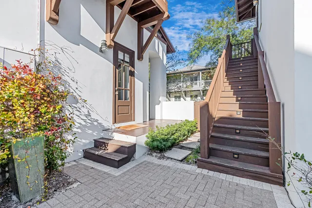 a view of living room with furniture and floor to ceiling window