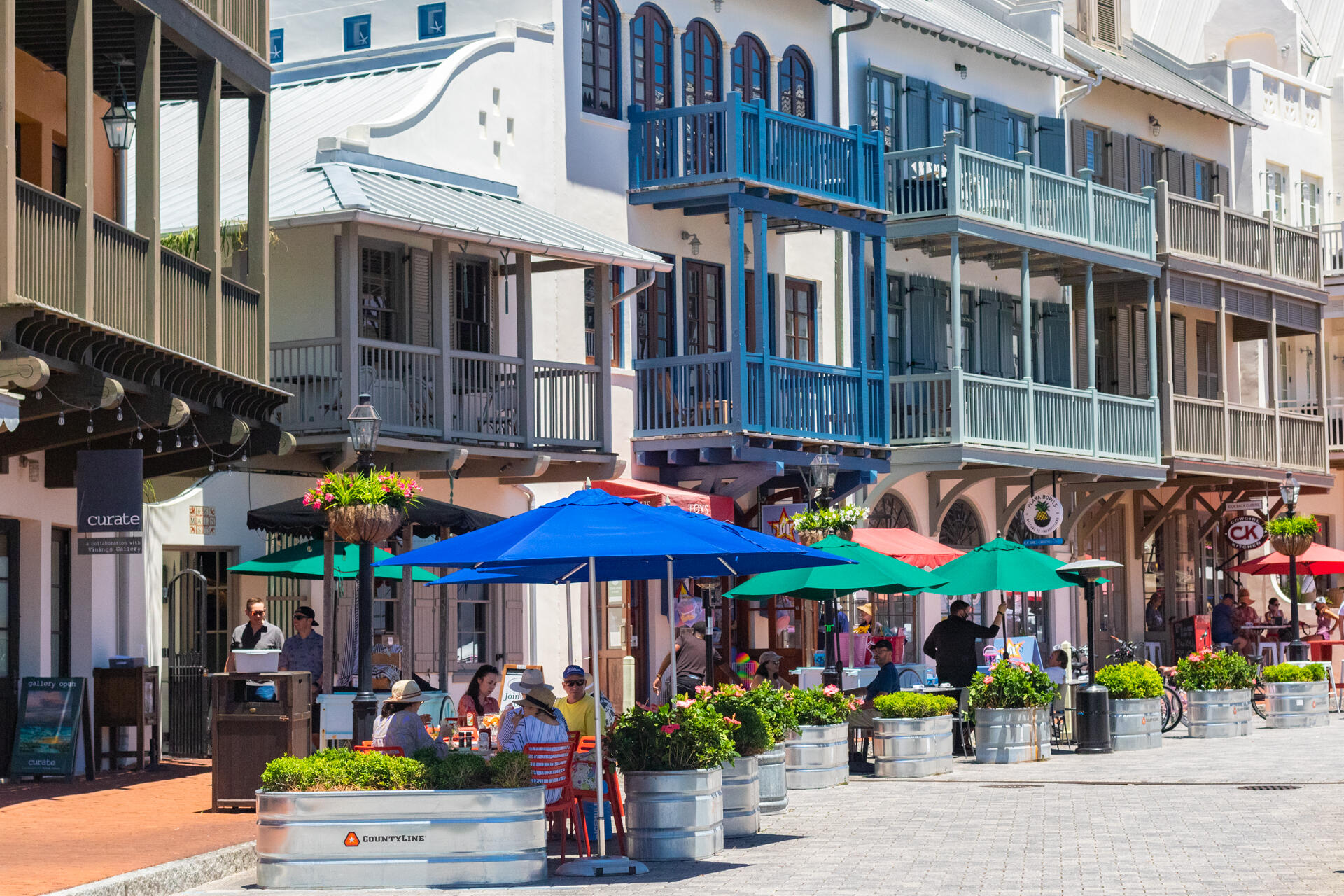 132 Kingston Road Rosemary Beach, FL 32461 - Photo 66 of 70 a view of street with small shops and fruits market
