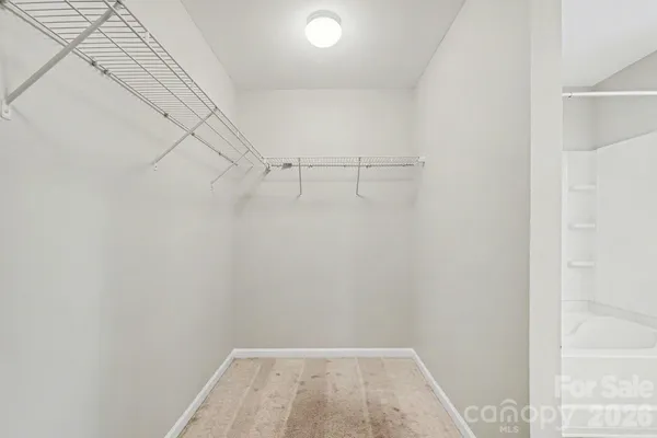 a view of a room with racks on the wall