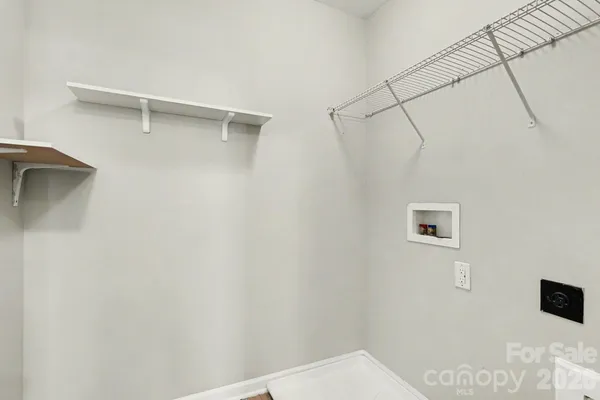 a bathroom with a shower and a shower head