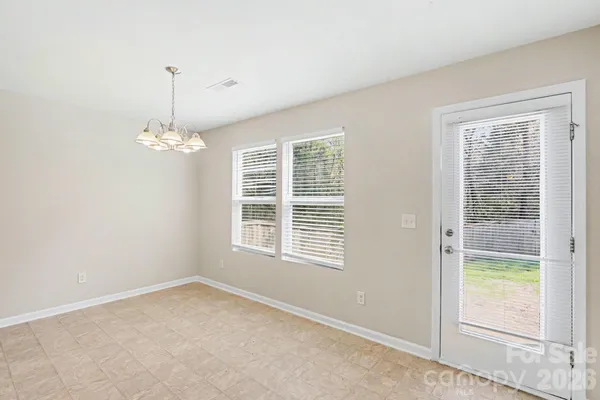 en empty room with windows