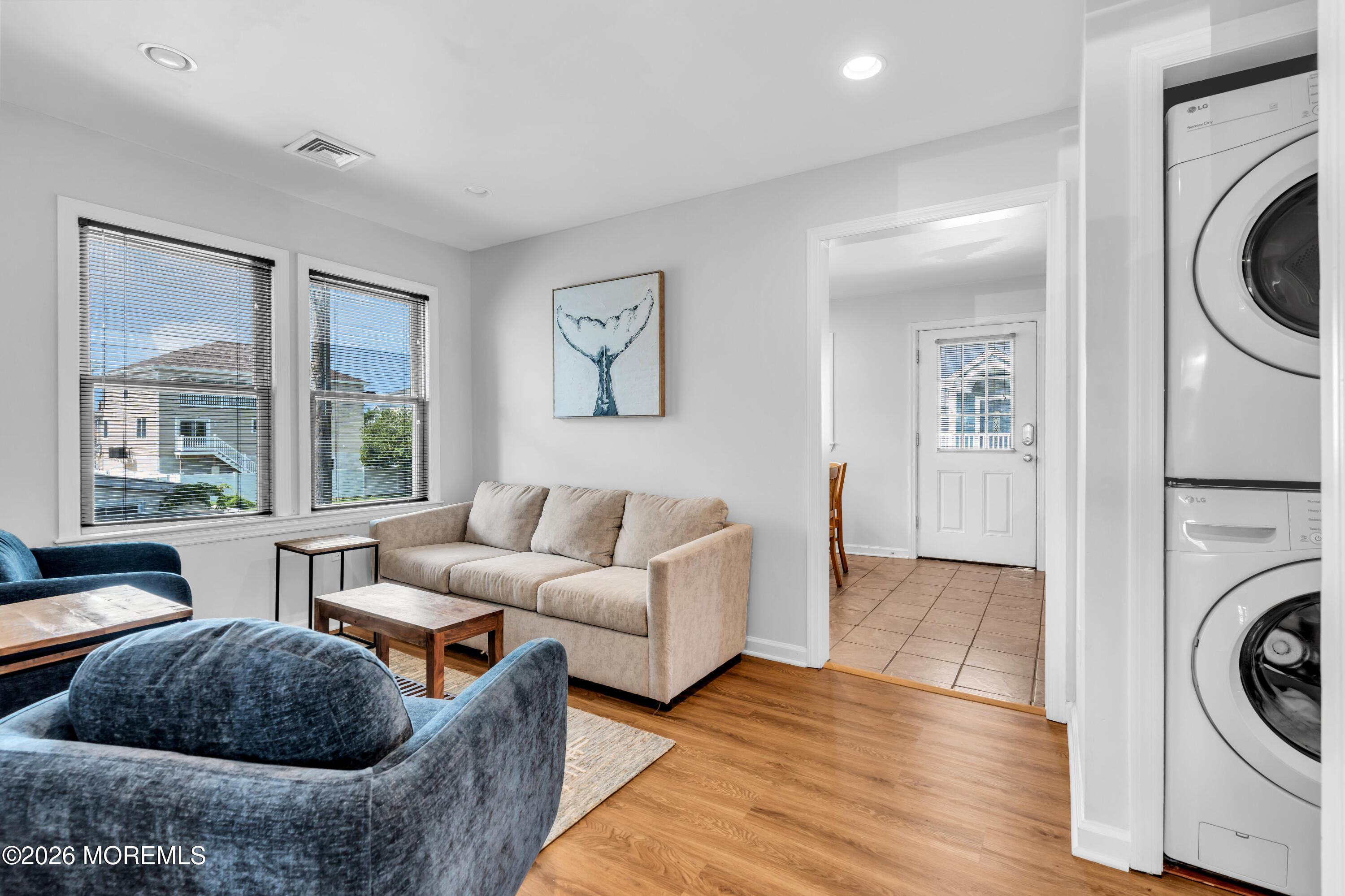 27 Arnold Avenue Point Pleasant Beach, NJ 08742 - Photo 12 of 48 a living room with furniture and a large window