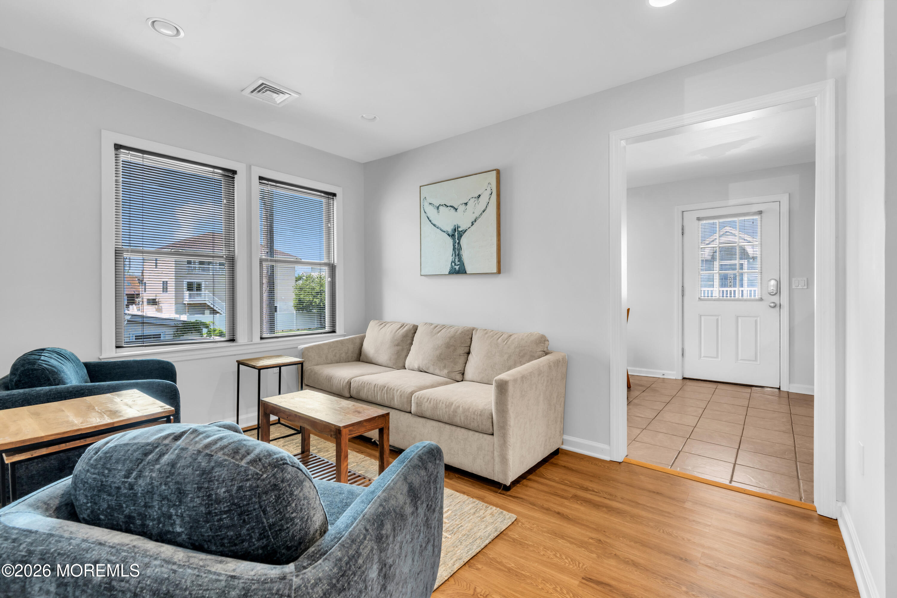27 Arnold Avenue Point Pleasant Beach, NJ 08742 - Photo 13 of 48 a living room with furniture and a wooden floor