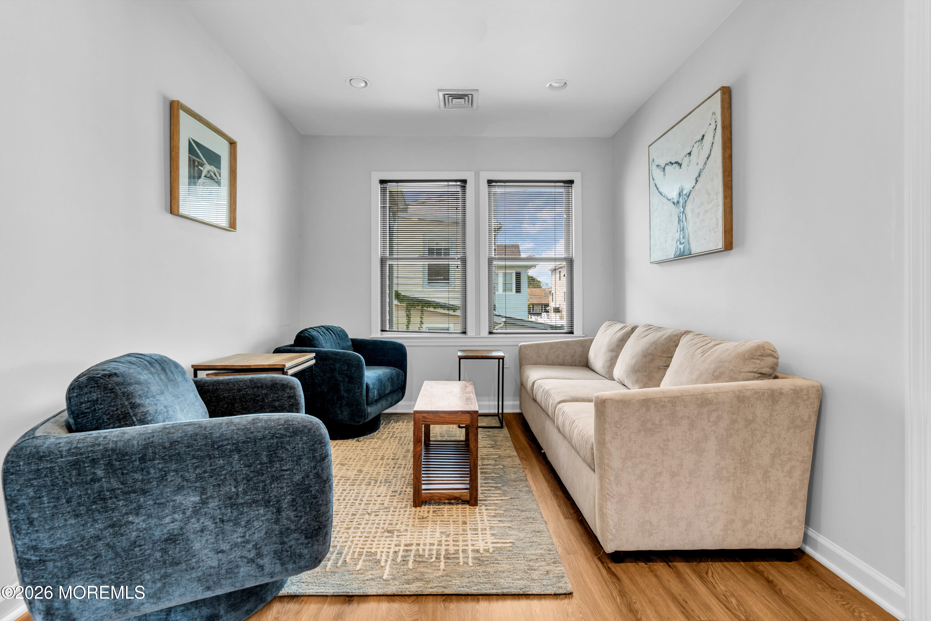 27 Arnold Avenue Point Pleasant Beach, NJ 08742 - Photo 14 of 48 a living room with furniture and a window