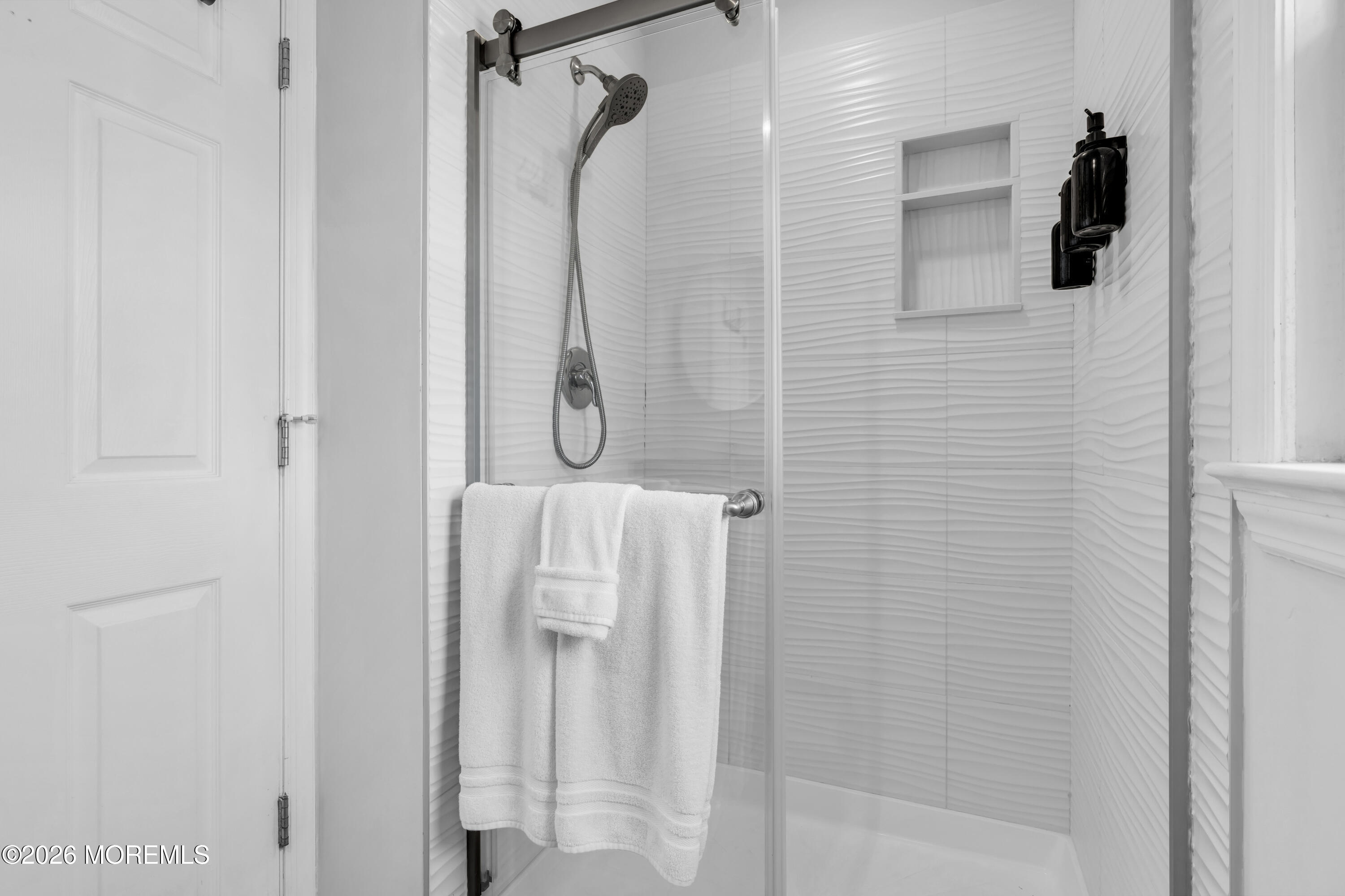 27 Arnold Avenue Point Pleasant Beach, NJ 08742 - Photo 19 of 48 a bathroom with a shower
