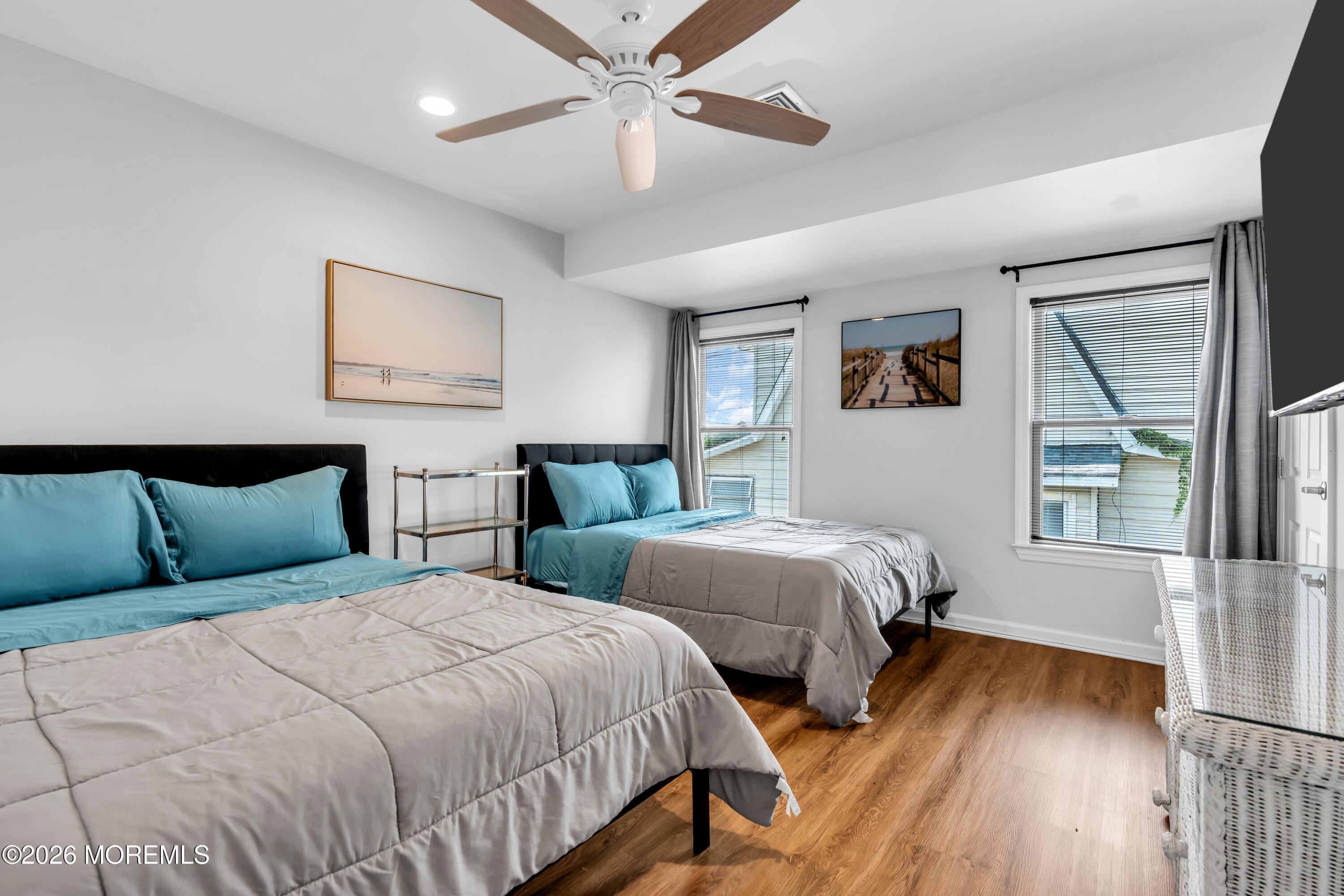 27 Arnold Avenue Point Pleasant Beach, NJ 08742 - Photo 29 of 48 a bedroom with two beds and a window