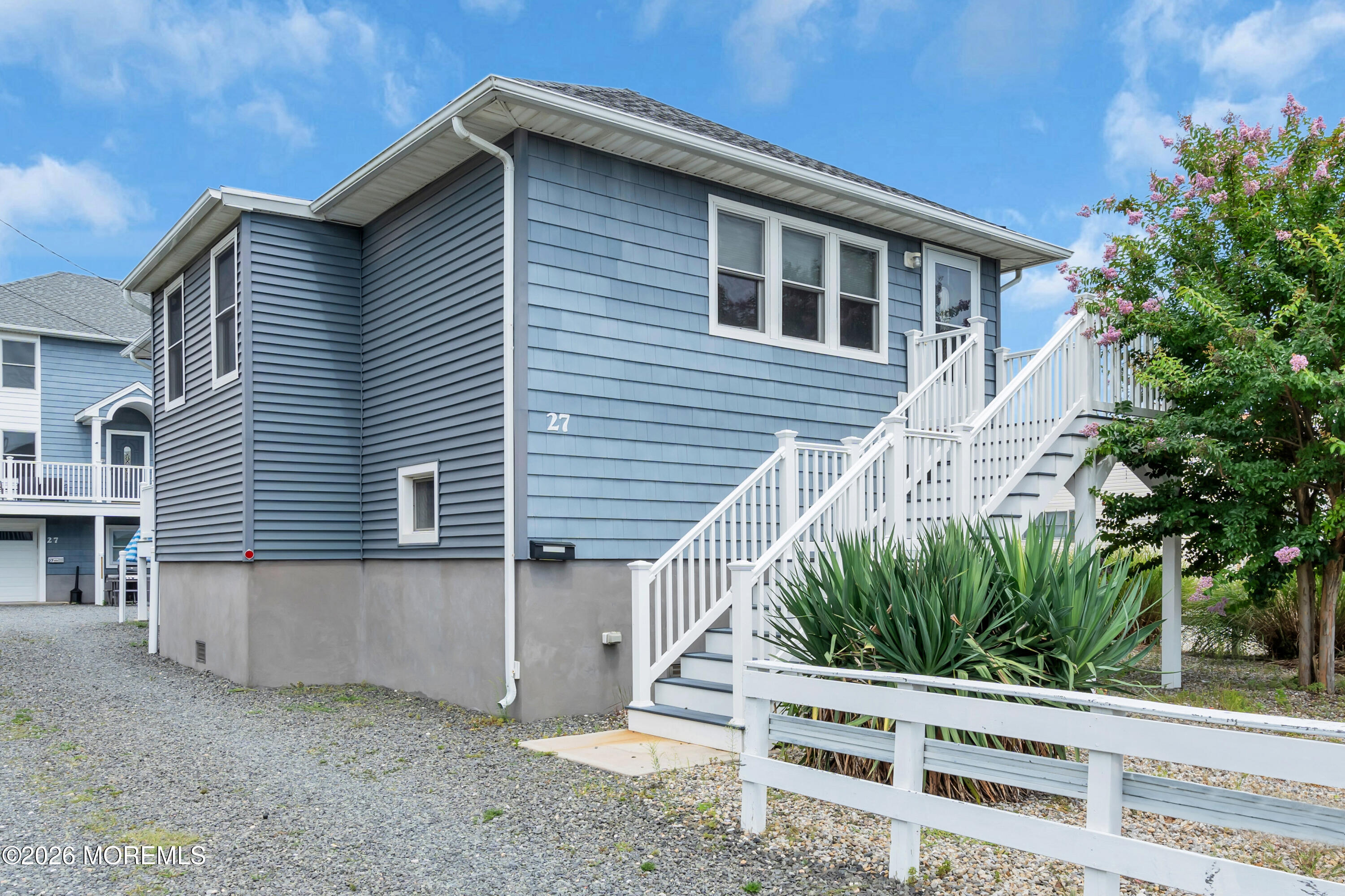 27 Arnold Avenue Point Pleasant Beach, NJ 08742 - Photo 3 of 48 a view of a house with a yard