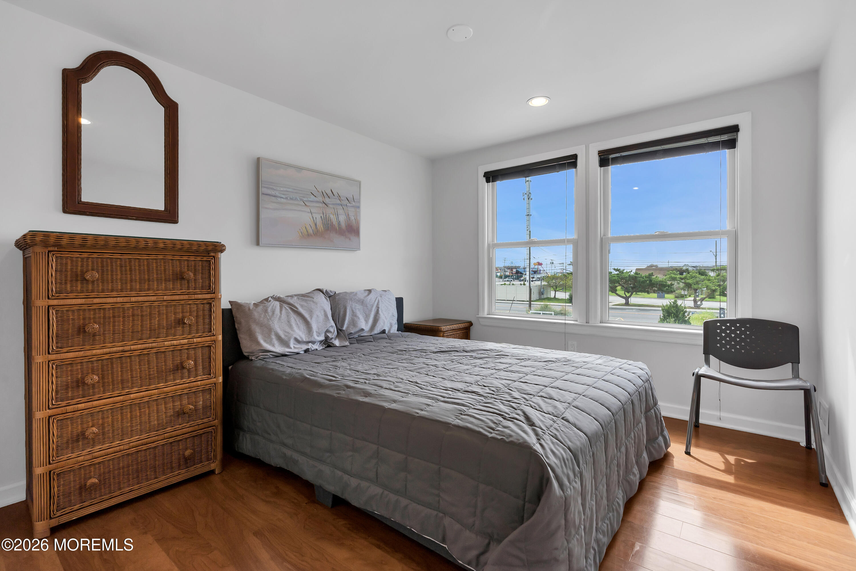 27 Arnold Avenue Point Pleasant Beach, NJ 08742 - Photo 38 of 48 a bedroom with a bed and a window