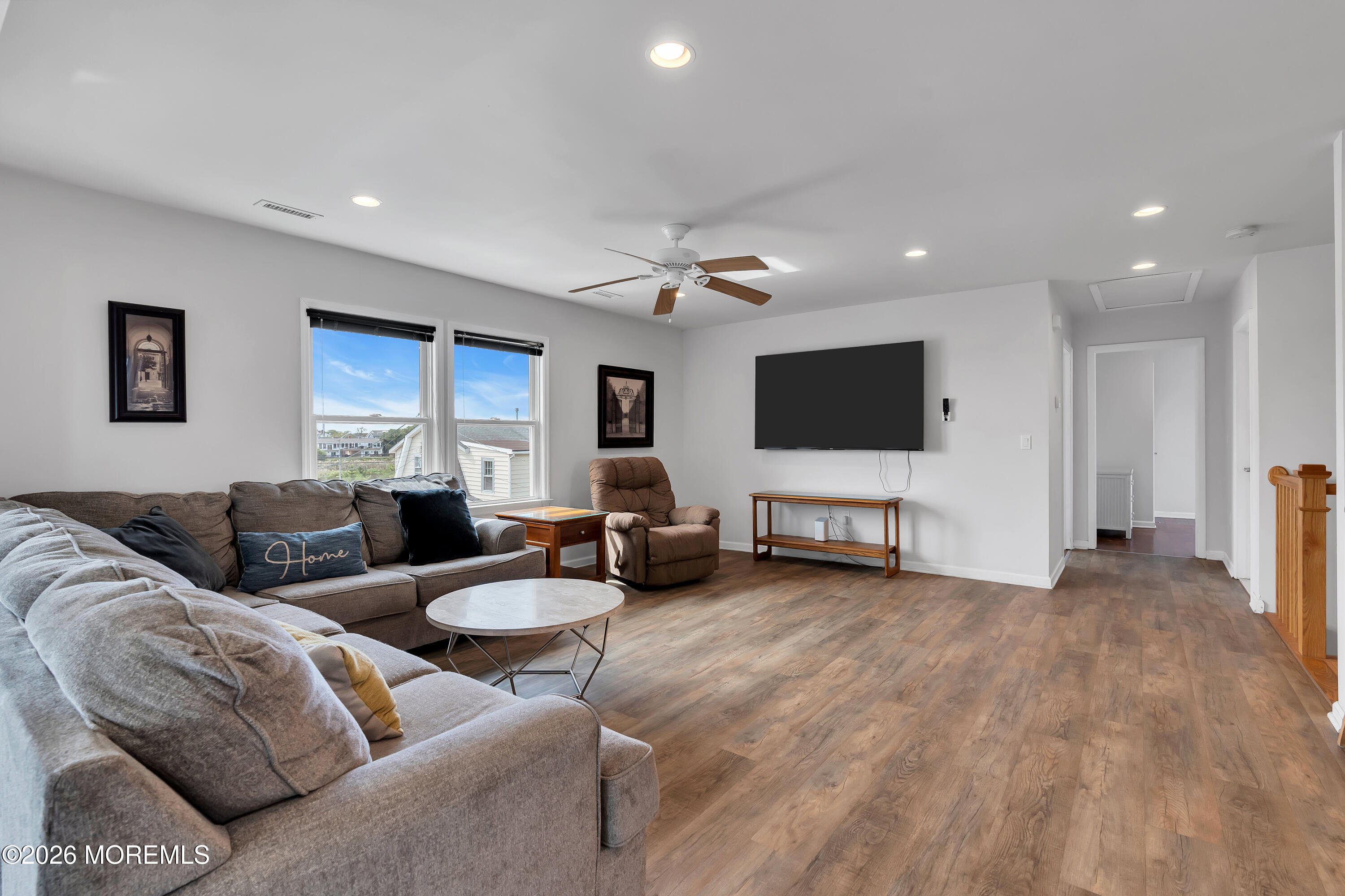 27 Arnold Avenue Point Pleasant Beach, NJ 08742 - Photo 41 of 48 a living room with furniture and a flat screen tv