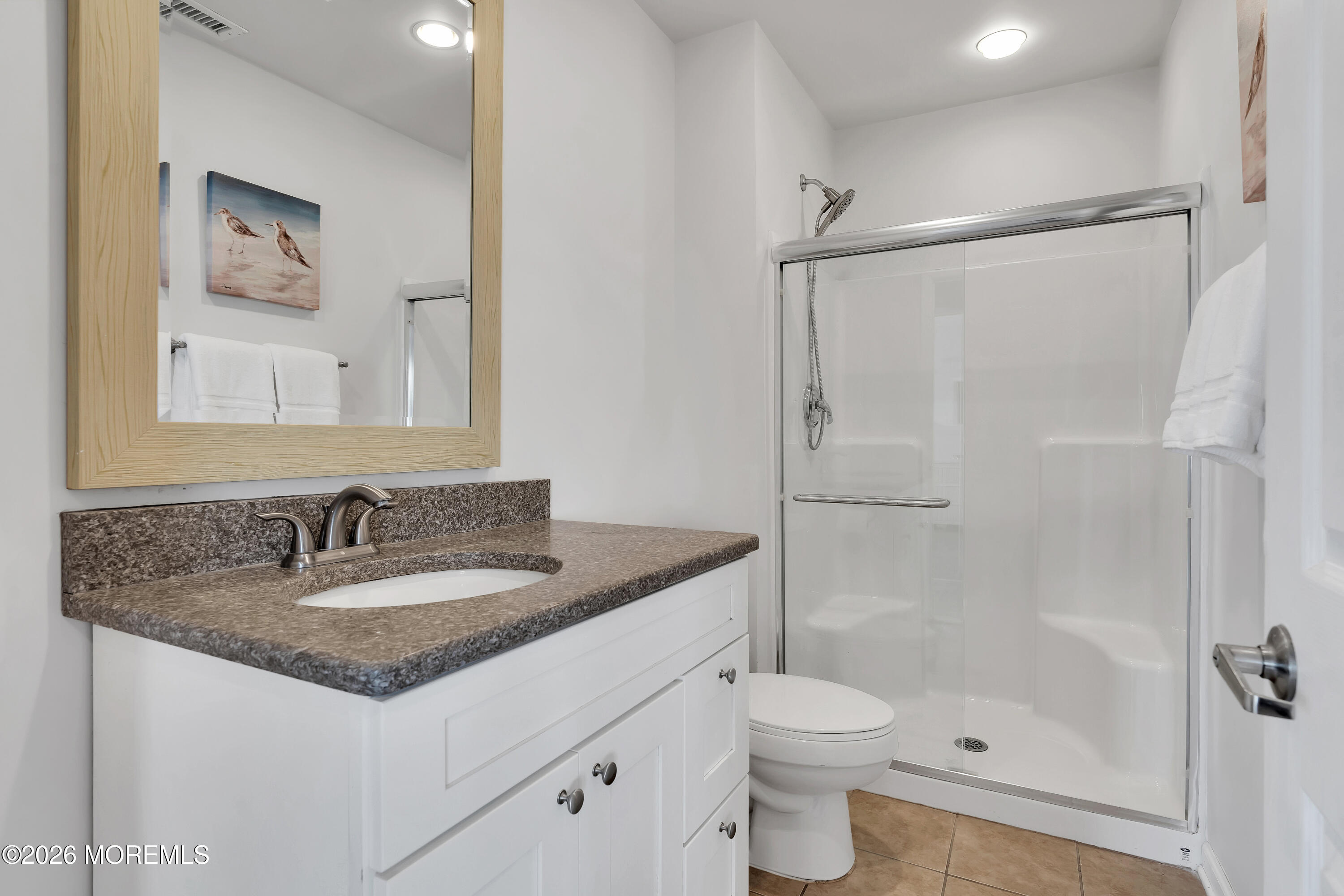 27 Arnold Avenue Point Pleasant Beach, NJ 08742 - Photo 45 of 48 a bathroom with a granite countertop sink toilet and shower