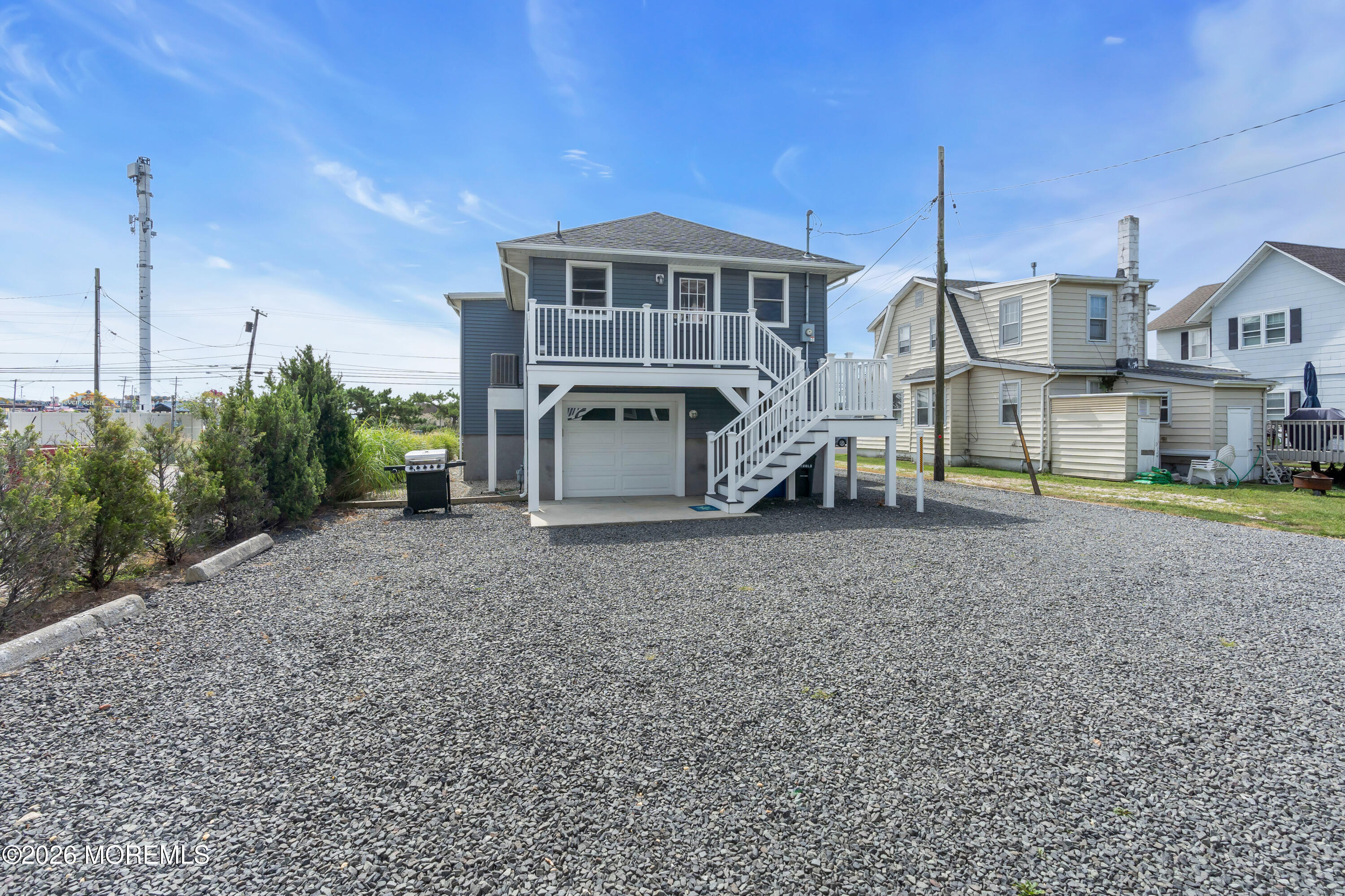 27 Arnold Avenue Point Pleasant Beach, NJ 08742 - Photo 46 of 48 a view of a house with a yard