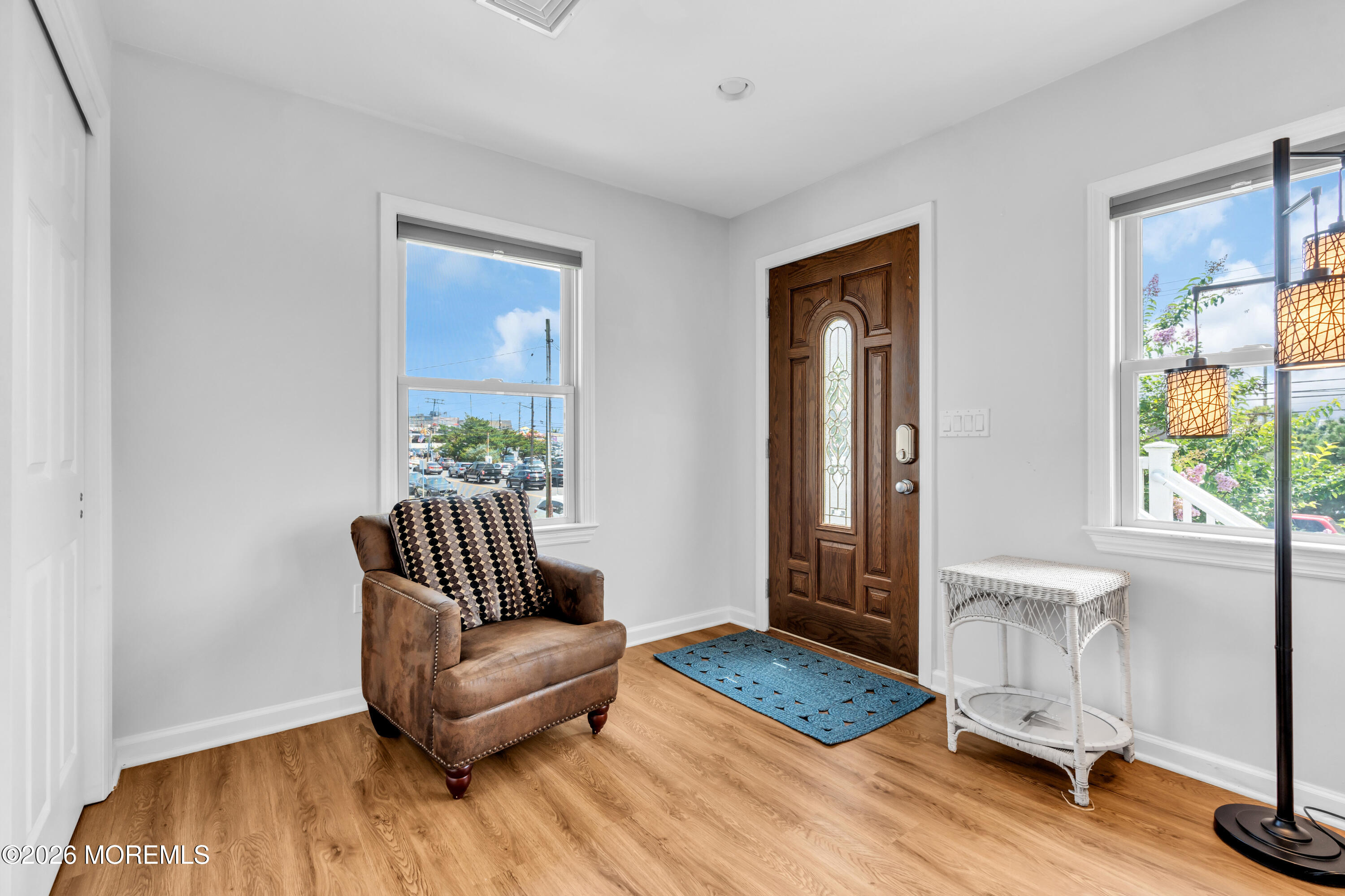 27 Arnold Avenue Point Pleasant Beach, NJ 08742 - Photo 8 of 48 a living room with furniture and wooden floor