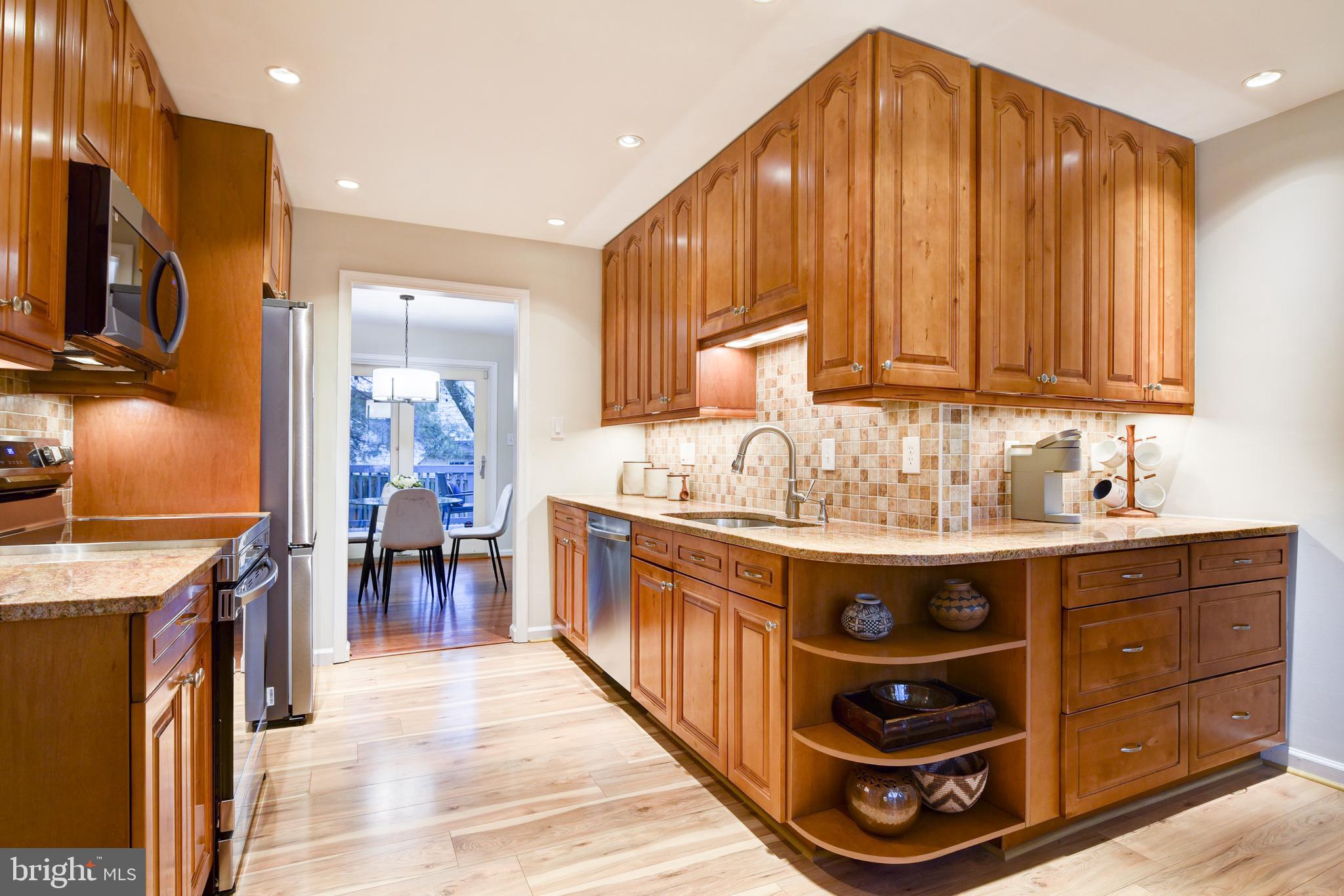 1520 Coat Ridge Road Herndon, VA 20170 - Photo 10 of 33 Updated Kitchen w/ Loads of Cabinets and Counters.
