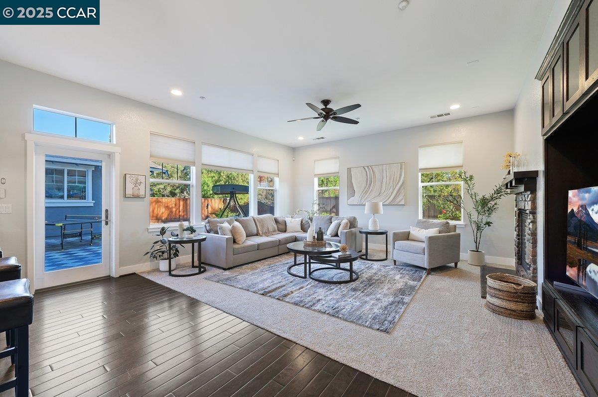 5656 Stockton Loop Livermore, CA 94550 - Photo 12 of 37 a living room with furniture and a flat screen tv