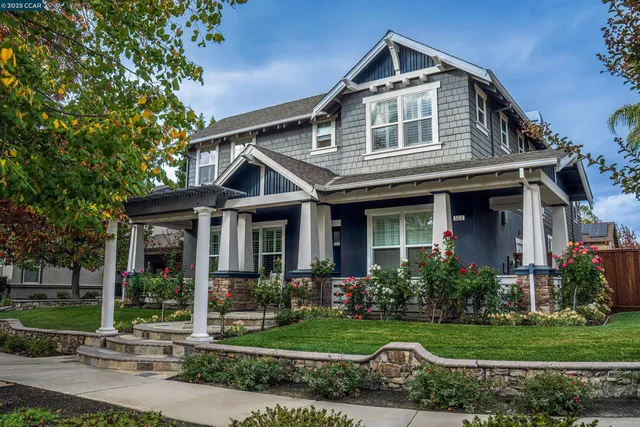 a bath tub sitting in a bathroom next to a window