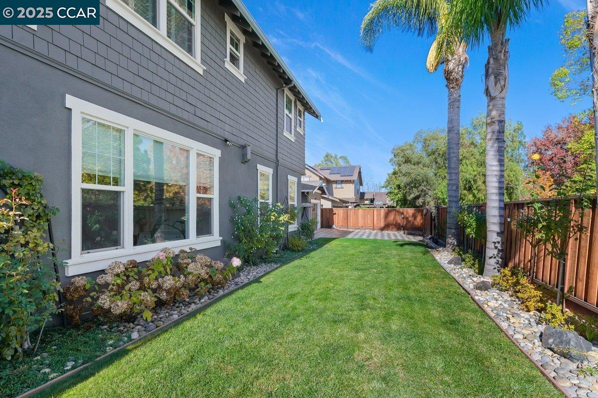 5656 Stockton Loop Livermore, CA 94550 - Photo 35 of 37 a view of a house with a yard and plants