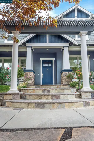 a spacious bathroom with a sink double vanity mirror and a bathtub