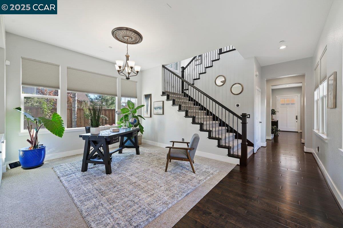 5656 Stockton Loop Livermore, CA 94550 - Photo 7 of 37 a view of a livingroom with furniture window and wooden floor