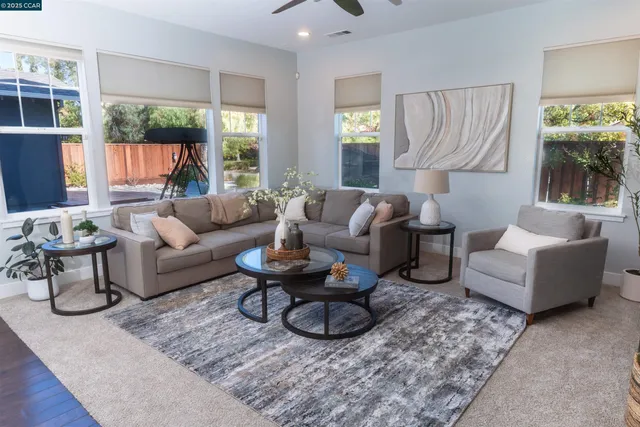 an aerial view of residential houses and outdoor space
