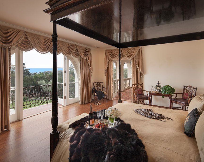 750 Riven Rock Road Montecito, CA 93108 - Photo 14 of 15 a bedroom with furniture and a large window