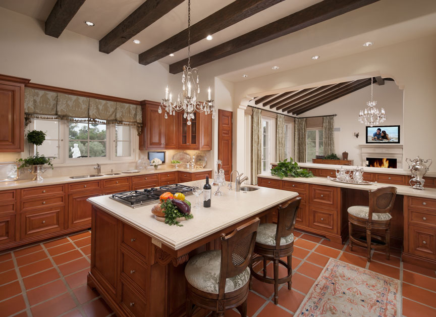 750 Riven Rock Road Montecito, CA 93108 - Photo 9 of 15 a kitchen with a table chairs and white cabinets