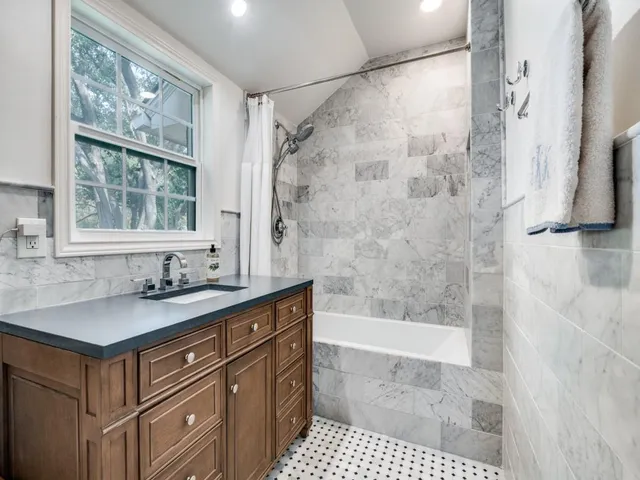 a bathroom with a sink and a bathtub