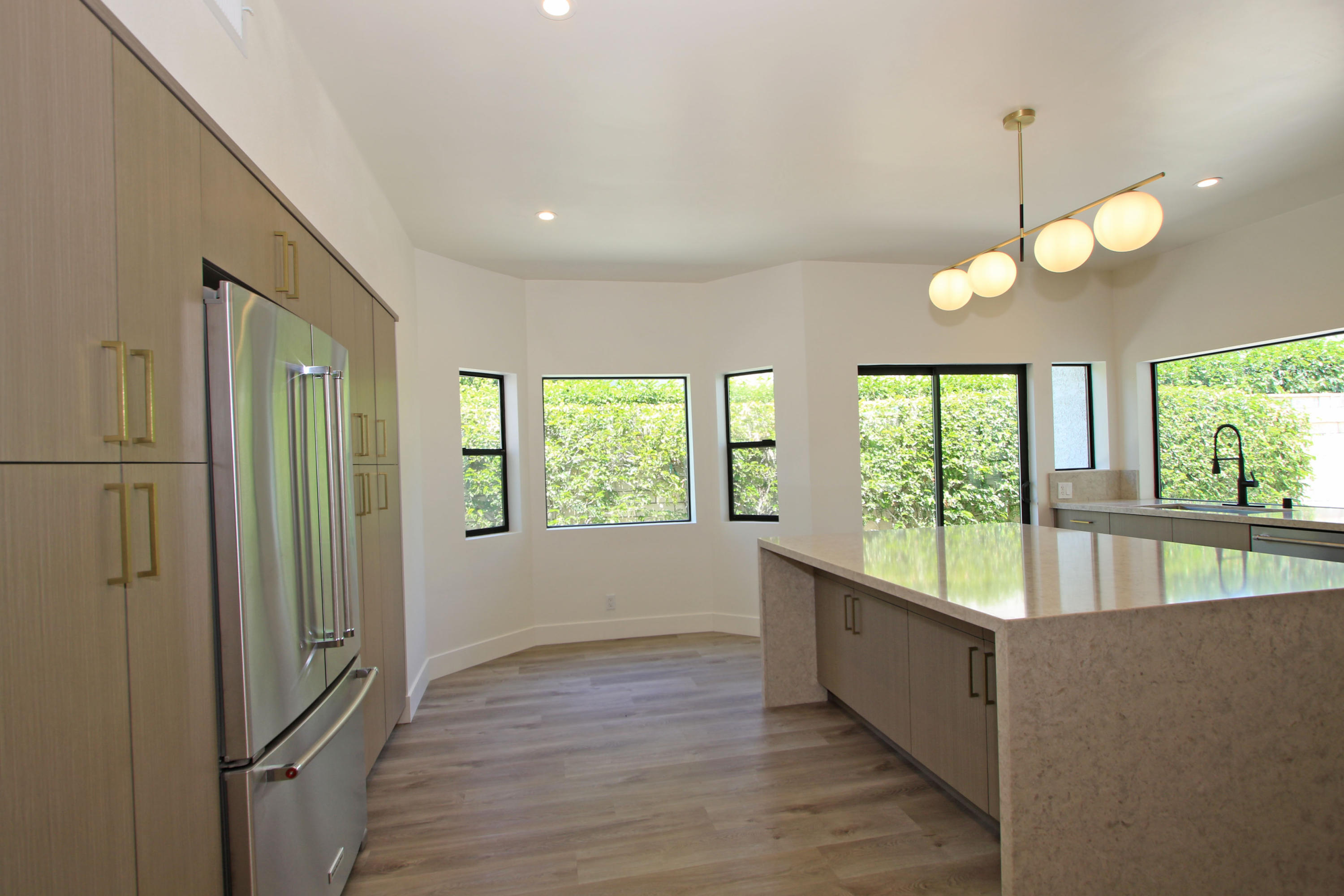87 Magdalena Drive Rancho Mirage, CA 92270 - Photo 19 of 64 a view of an entryway with wooden floor and garden