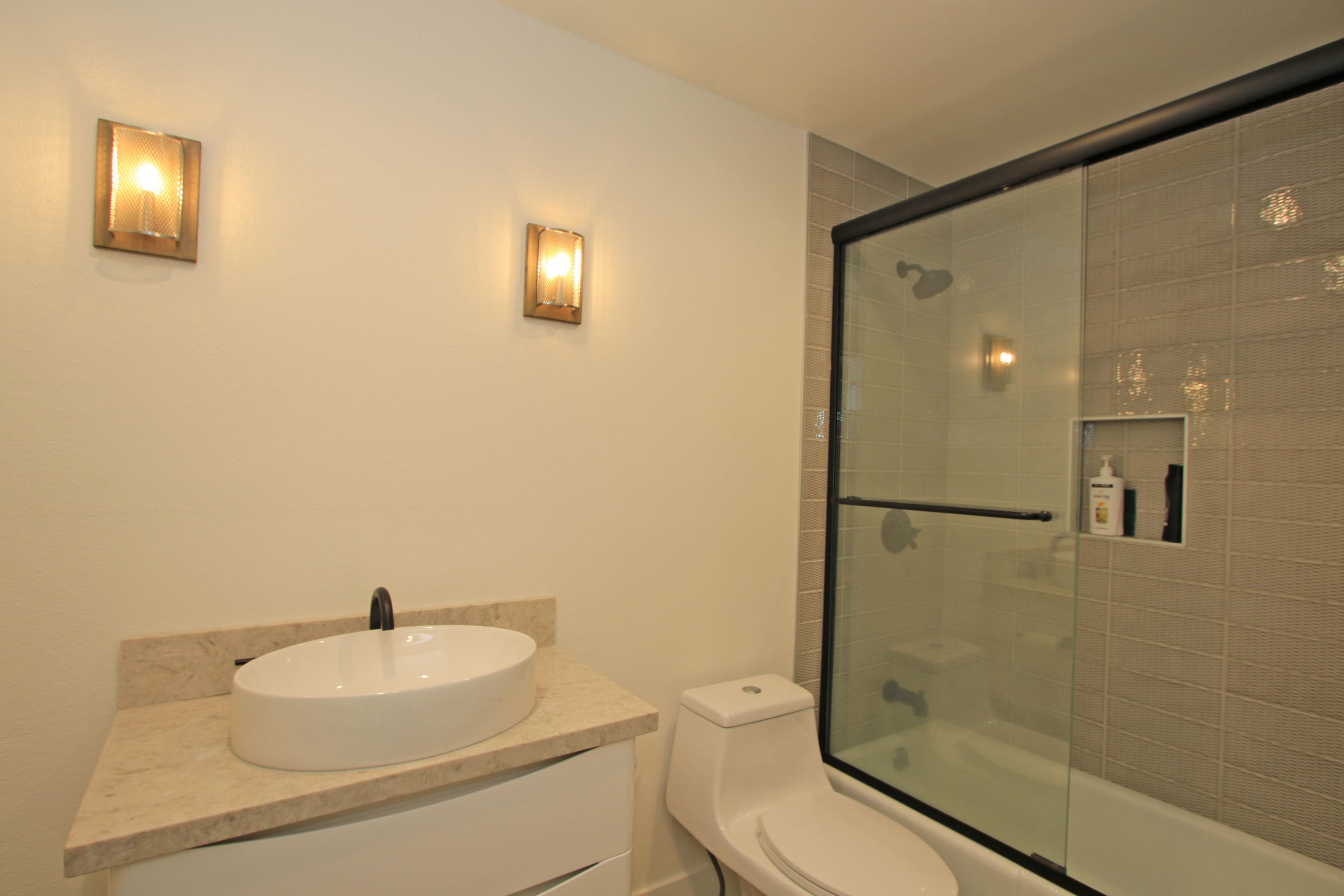 87 Magdalena Drive Rancho Mirage, CA 92270 - Photo 41 of 64 a bathroom with a sink toilet and shower
