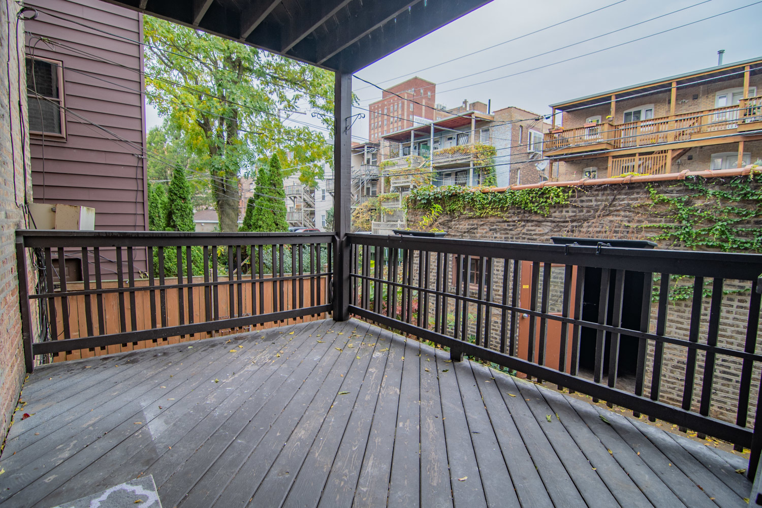844 West Lakeside Place, Unit 1W Chicago, IL 60640 - Photo 14 of 14 a view of city from a balcony