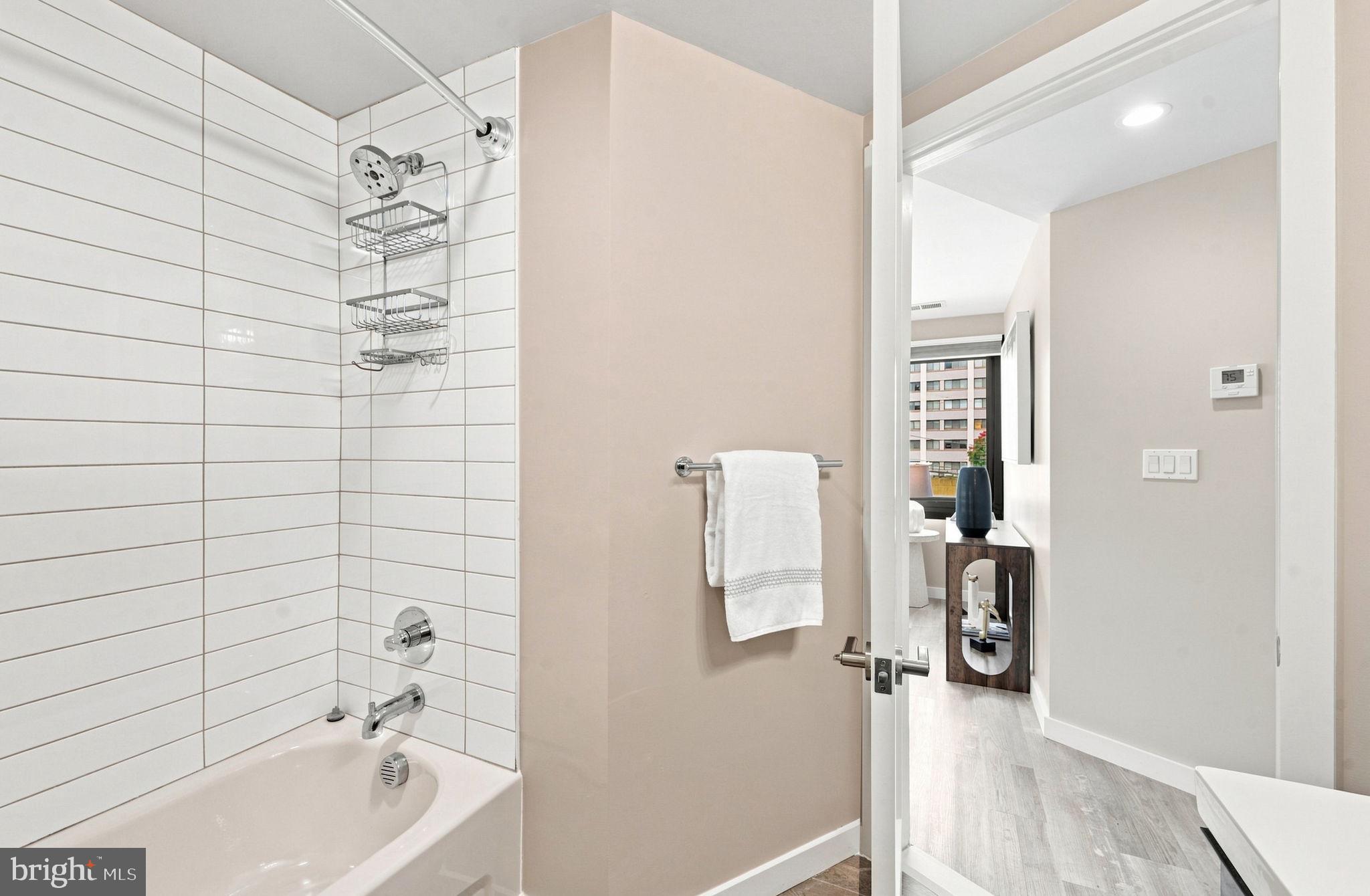 700 Roeder Road, Unit 203 Silver Spring, MD 20910 - Photo 20 of 37 Modern bathroom with sleek finishes.