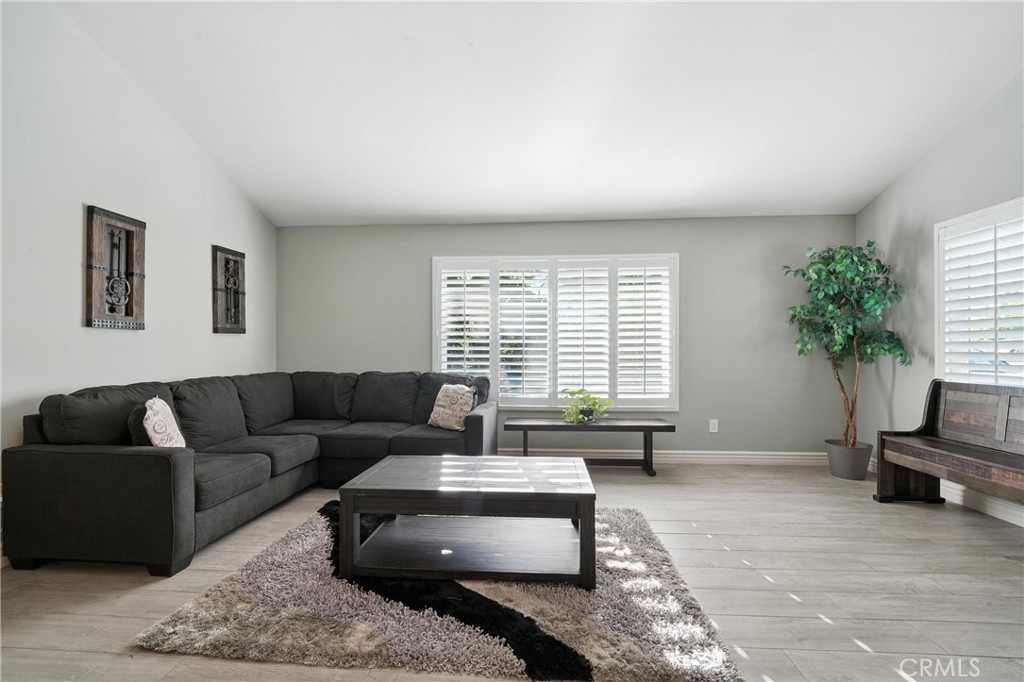 1817 Balboa Way Upland, CA 91784 - Photo 20 of 64 a living room with furniture and a potted plant