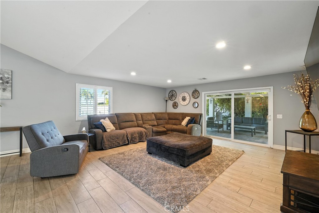 1817 Balboa Way Upland, CA 91784 - Photo 25 of 64 a living room with furniture and a large window