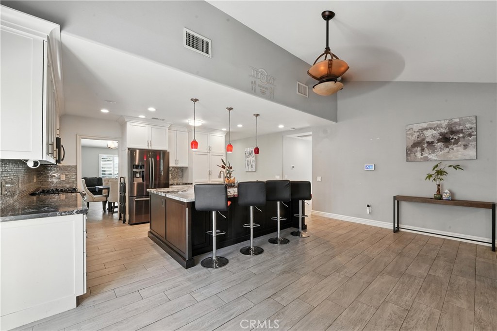 1817 Balboa Way Upland, CA 91784 - Photo 26 of 64 a view of dining room with furniture and wooden floor