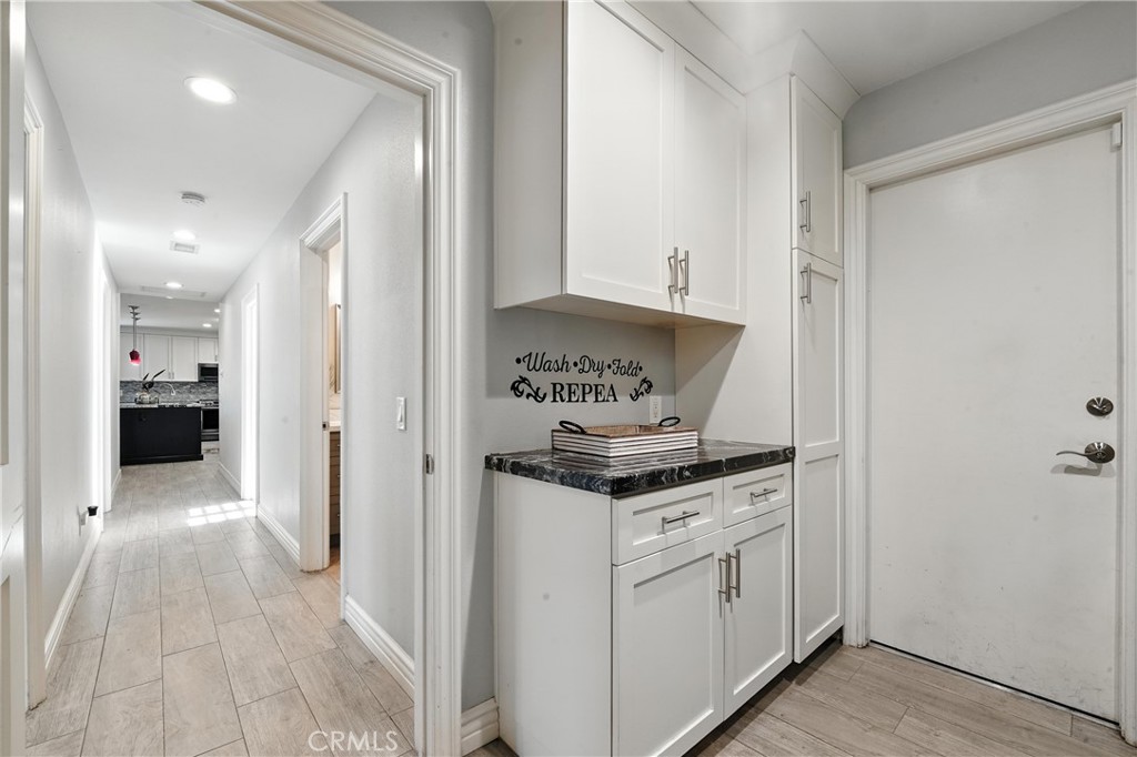 1817 Balboa Way Upland, CA 91784 - Photo 39 of 64 a view of kitchen with stainless steel appliances granite countertop a refrigerator and a sink