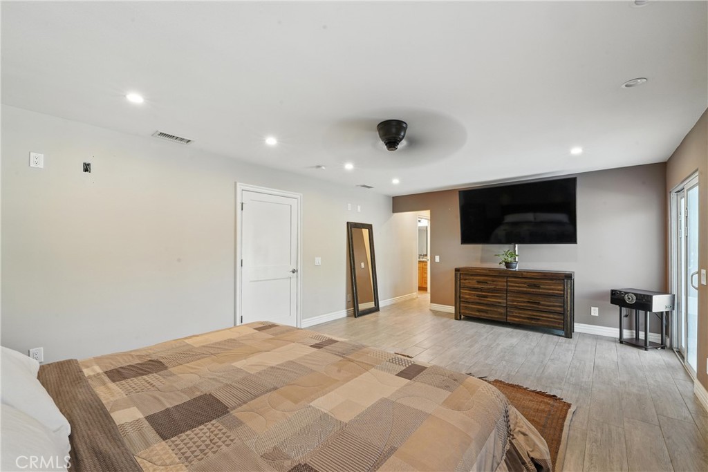 1817 Balboa Way Upland, CA 91784 - Photo 41 of 64 a bedroom with furniture and flat screen tv