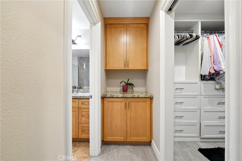 1817 Balboa Way Upland, CA 91784 - Photo 42 of 64 a view of walk in closet with clothes and shoes