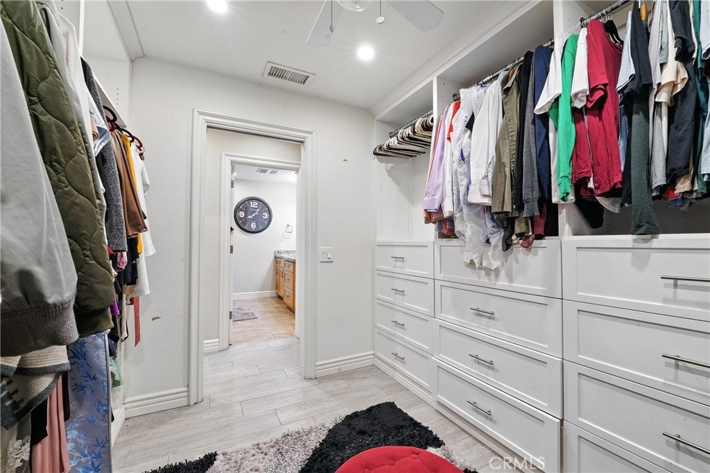 1817 Balboa Way Upland, CA 91784 - Photo 44 of 64 a view of walk in closet with clothes