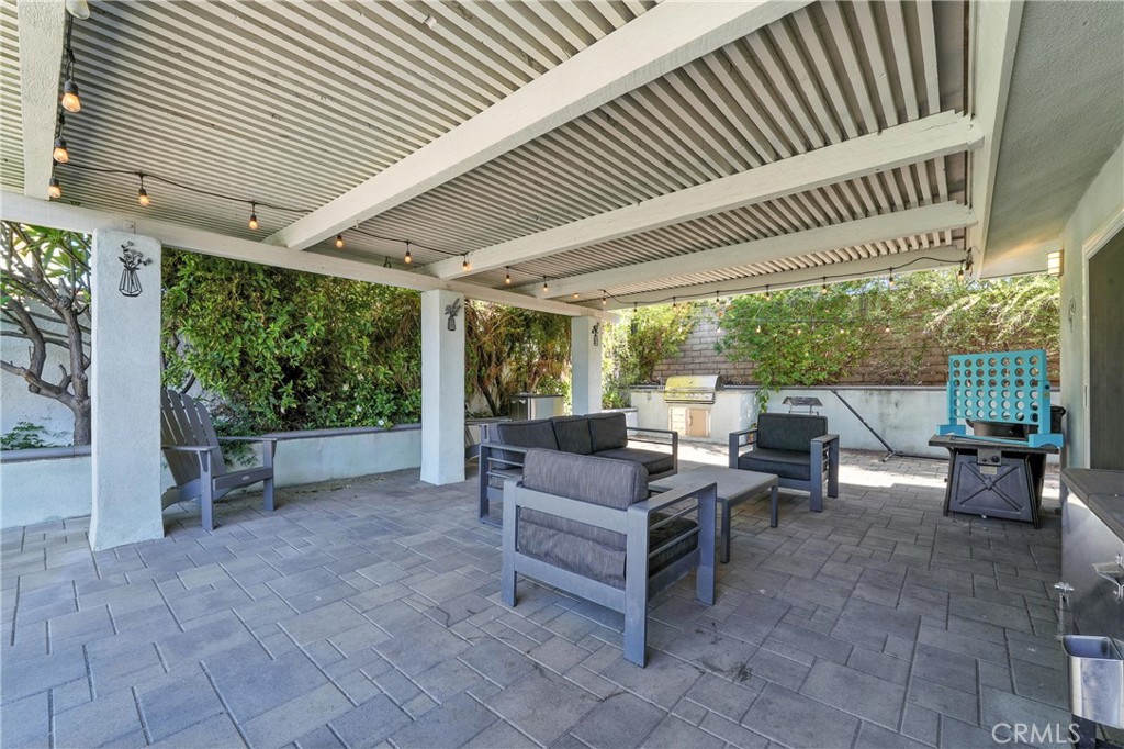 1817 Balboa Way Upland, CA 91784 - Photo 52 of 64 a view of a patio with chairs and backyard