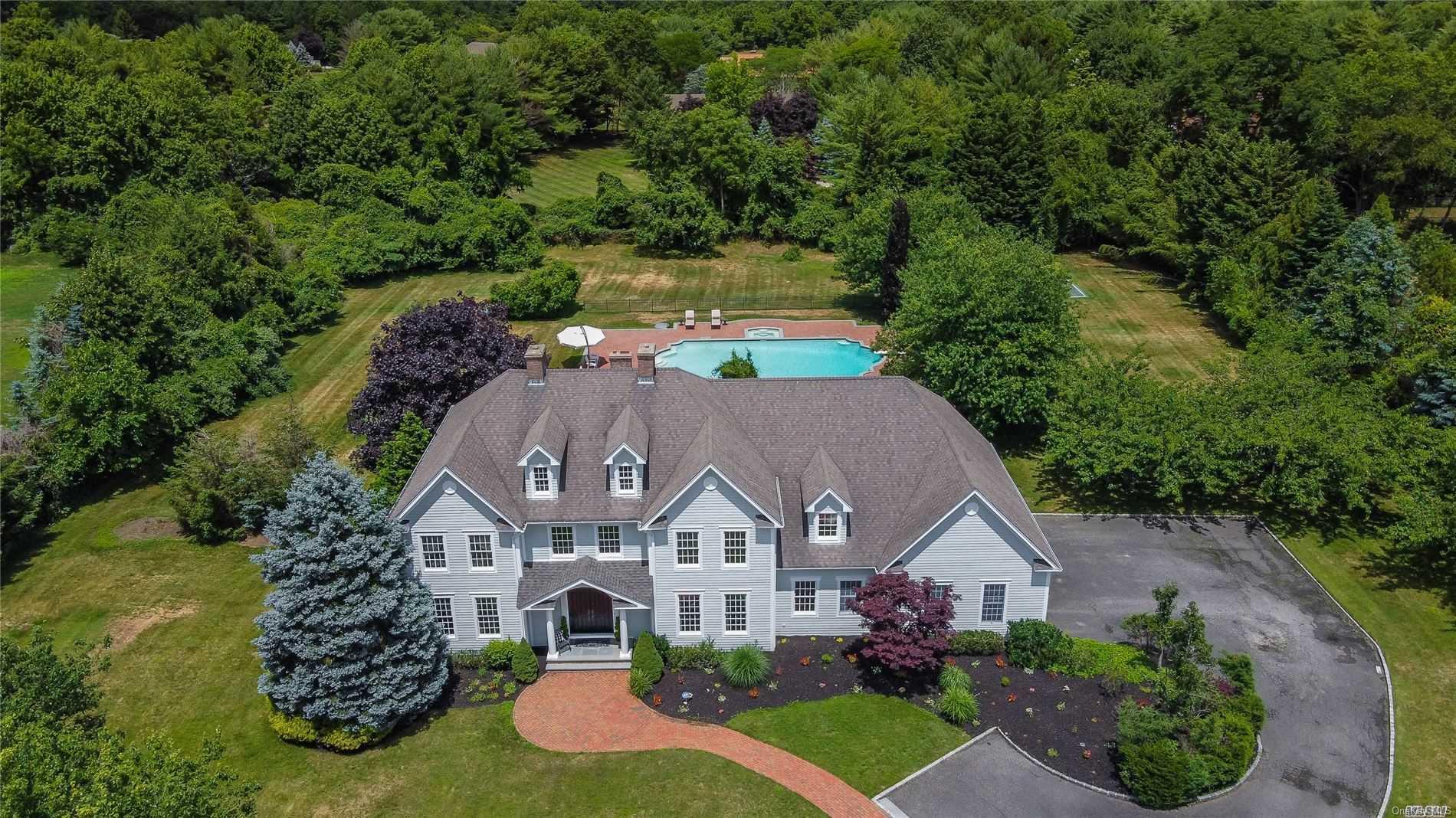 8 Wicks Lane St. James, NY 11780 - Photo 1 of 1 an aerial view of a house