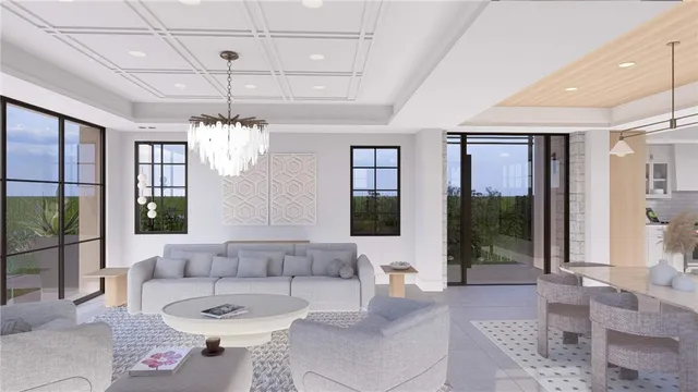 a living room with furniture and a chandelier