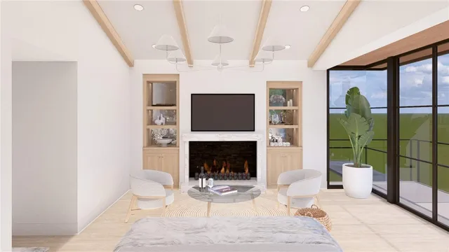 a living room with furniture a flat screen tv and a fireplace