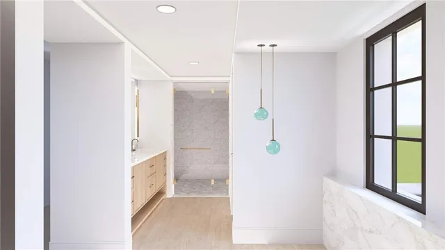 a view of a room with wooden floor and windows